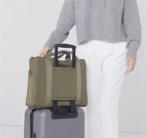 suitcase with cabin bag attached.